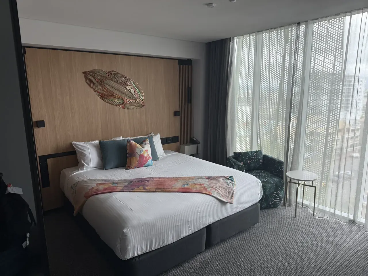 Our neatly made hotel bed on the first afternoon
