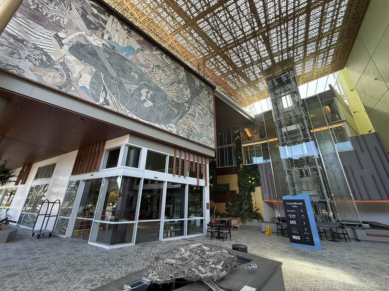 The Bailey entrance with mural, patterned ceiling and reception sign