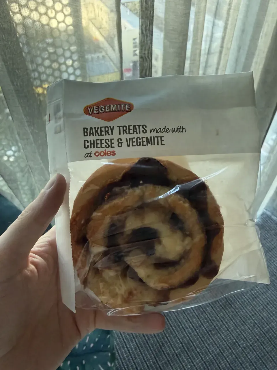 A packaged Vegemite and cheese roll from the supermarket